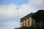 Nottingham in Parliament Day flag with Nottingham Castle in the background